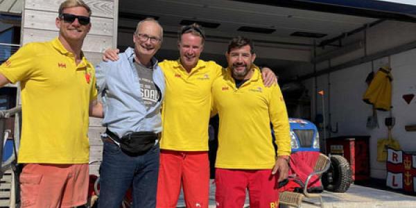 Richard Wright with the RNLI lifeguards who saved him