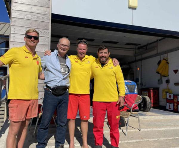 Richard Wright with the RNLI lifeguards who saved him